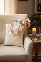 Baumwollbeutel Self Love Era gefüllt auf cremefarbenem Sessel mit Tagebuch Kerze und Kristallen